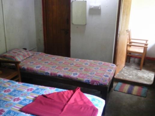 From interior of attached cottage No.5, seen are toilet & entrance verandah